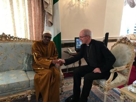 Archbishop of Canterbury, Justin Welby sits with Nigeria's President Muhammadu Buhari in Abuja House, London, Britain March 9, 2017. Nigeria Presidential Office/Handout via REUTERS