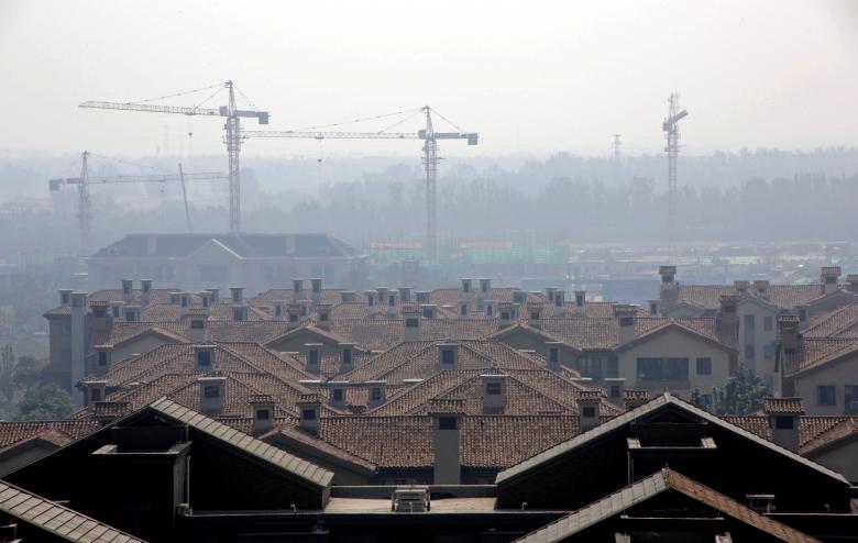 FILE PHOTO: Apartment blocks are pictured in Wuqing District of Tianjin, China October 10, 2016. Picture taken October 10, 2016. REUTERS/Jason Lee/File Photo