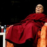 FILE PHOTO: Tibet's exiled spiritual leader the Dalai Lama is seen at the Arcimboldi theater before receiving honorary citizenship of the city of Milan, in Milan, Italy October 20, 2016. REUTERS/Stefano Rellandini/File Photo