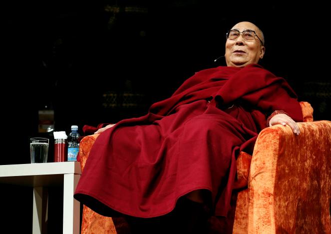 FILE PHOTO: Tibet's exiled spiritual leader the Dalai Lama is seen at the Arcimboldi theater before receiving honorary citizenship of the city of Milan, in Milan, Italy October 20, 2016. REUTERS/Stefano Rellandini/File Photo
