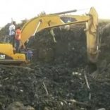Excavators work after a landslide at a garbage dump on the outskirts of Addis Ababa, Ethiopia in this still image taken from a video from March 12, 2017. REUTERS/Reuters TV