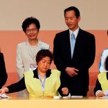 Carrie Lam (2nd L) smiles as officials count votes during the election for Hong Kong's next Chief Executive in Hong Kong, China, March 26, 2017.   REUTERS/Bobby Yip