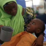 A woman feeds her daughter, who is suffering brain damage resulting from Cerebral Spinal Meningitis, at the Save the Children stabilisation ward in Maiduguri, Nigeria November 30, 2016. Picture taken November 30, 2016. REUTERS/Afolabi Sotunde
