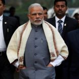 Prime Minister Narendra Modi walks to speak with the media as he arrives at the parliament house to attend the first day of the budget session, in New Delhi, India, January 31, 2017. REUTERS/Adnan Abidi