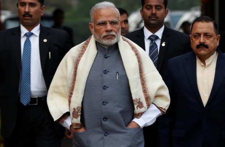 Prime Minister Narendra Modi walks to speak with the media as he arrives at the parliament house to attend the first day of the budget session, in New Delhi, India, January 31, 2017. REUTERS/Adnan Abidi