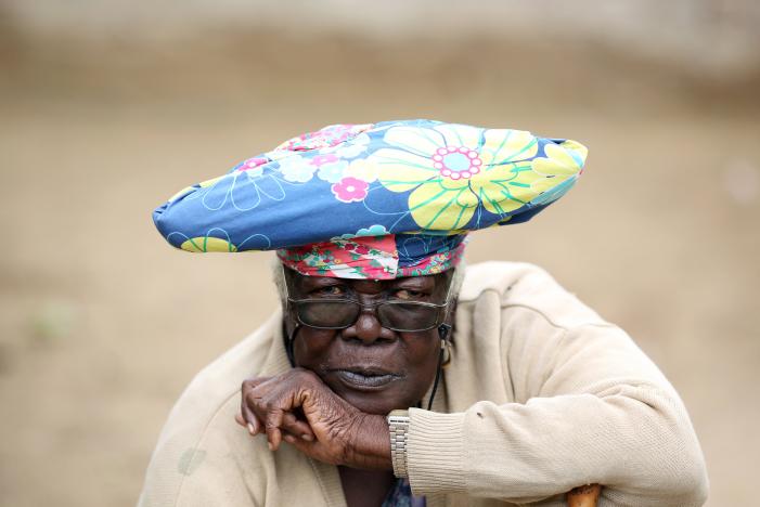 Namibian Alex Kaubtauuapela leans on her walking stick at her home in Okahandja, north of Windhoek, Namibia, February 21, 2017. Picture taken February 21, 2017. REUTERS/Siphiwe Sibeko