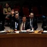 Russian Deputy Ambassador to the United Nations Vladimir Safronkov raises his arm to vote against a United Nations Security Council resolution to ban the supply of helicopters to the Syrian government and to blacklist Syrian military commanders over accusations of toxic gas attacks at U.N. headquarters in New York City, U.S., February 28, 2017. REUTERS/Mike Segar