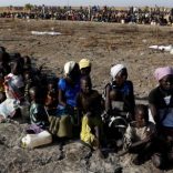 Women and children wait to be registered prior to a food distribution carried out by the United Nations World Food Programme (WFP) in Thonyor, Leer state, South Sudan, February 26, 2017. REUTERS/Siegfried Modola