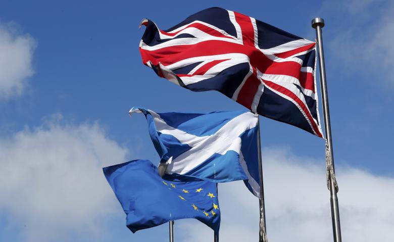The Union flag,The Scottish Saltire and The European flag fly at the Scottish Parliament in Edinburgh Scotland, Britain March 21, 2017. REUTERS/Russell Cheyne