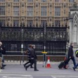 Pedestrians walk past Carriage Gate at the Houses of Parliament, which is the scene of a recent attack, in London, Britain March 24, 2017. REUTERS/Darren Staples