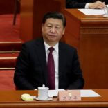 China's President Xi Jinping attends the opening session of the Chinese People's Political Consultative Conference in Beijing. REUTERS/Jason Lee