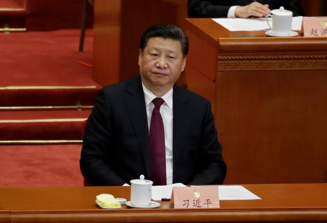 China's President Xi Jinping attends the opening session of the Chinese People's Political Consultative Conference in Beijing. REUTERS/Jason Lee