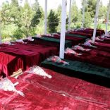 Coffins containing the bodies of Afghan national Army (ANA) soldiers killed in April 21's attack on an army headquarters are lined up in Mazar-i-Sharif, northern Afghanistan April 22, 2017. Presidential Palace /Handout via REUTERS