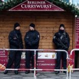 FILE PHOTO: Police stand guard at the Kaiser-Wilhelm-Gedaechtniskirche Christmas market in Berlin, Germany, December 21, 2016, after a truck ploughed through a crowd at the Breitscheid square Christmas market.     REUTERS/Hannibal Hanschke/File Photo - RTS12FEB