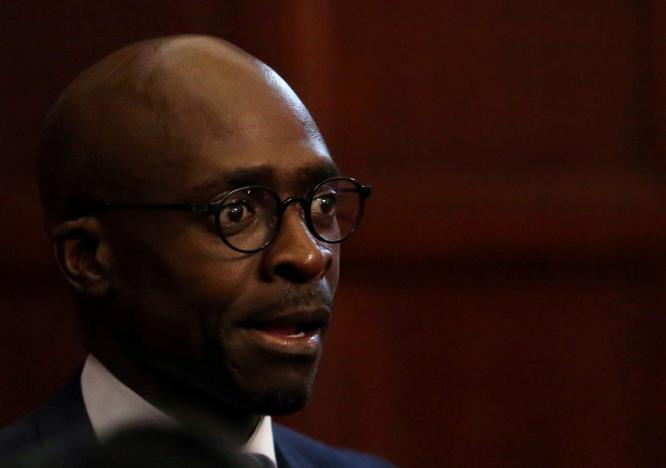 FILE PHOTO: South Africa's new finance minister, Malusi Gigaba looks on after the swearing in of cabinet ministers following a reshuffle that replaced Pravin Gordhan as finance minister with Gigaba along with various other ministers and their deputies in Pretoria, South Africa, March 31,2017. REUTERS/Siphiwe Sibeko/File Photo