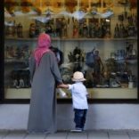 A woman wears a burka while visiting Garmisch-Partenkirchen, Germany August 16, 2016. REUTERS/Michaela Rehle