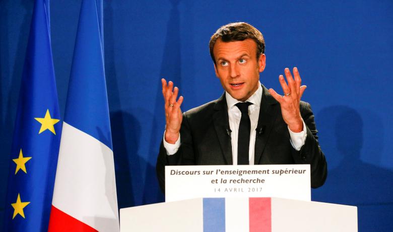 Emmanuel Macron, head of the political movement En Marche !, or Onwards !, and candidate for the 2017 French presidential election, delivers a speech during a visit at the INRIA in Montbonnot-Saint-Martin, near Grenoble, France, April 14, 2017. REUTERS/Robert Pratta