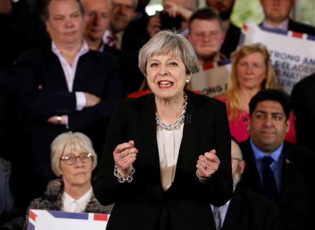 Britain's Prime Minister Theresa May delivers a speech to Conservative Party members to launch their election campaign in Walmsley Parish Hall, Bolton, Britain April 19, 2017. REUTERS/Andrew Yates