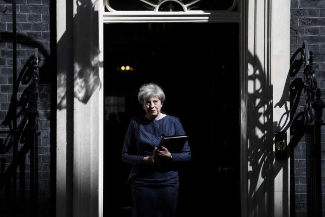 Britain's Prime Minister Theresa May prepares to speak to the media outside 10 Downing Street.      REUTERS/Stefan Wermuth
