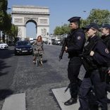 Armed French police patrol the Champs Elysees Avenue the day after a policeman was killed and two others were wounded in a shooting incident in Paris, France, April 21, 2017. REUTERS/Benoit Tessier