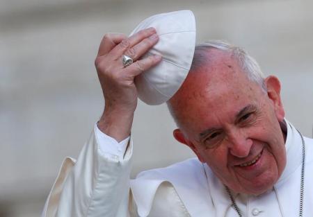 Pope Francis' wears his skull cap during Wednesday general audience in Saint Peter's square at the Vatican, April 26, 2017. REUTERS/Tony Gentile