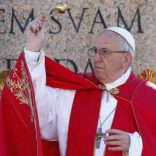 Pope Francis blesses with holy water as he leads the Palm Sunday Mass in Saint Peter's Square at the Vatican April 9, 2017. REUTERS/Tony Gentile