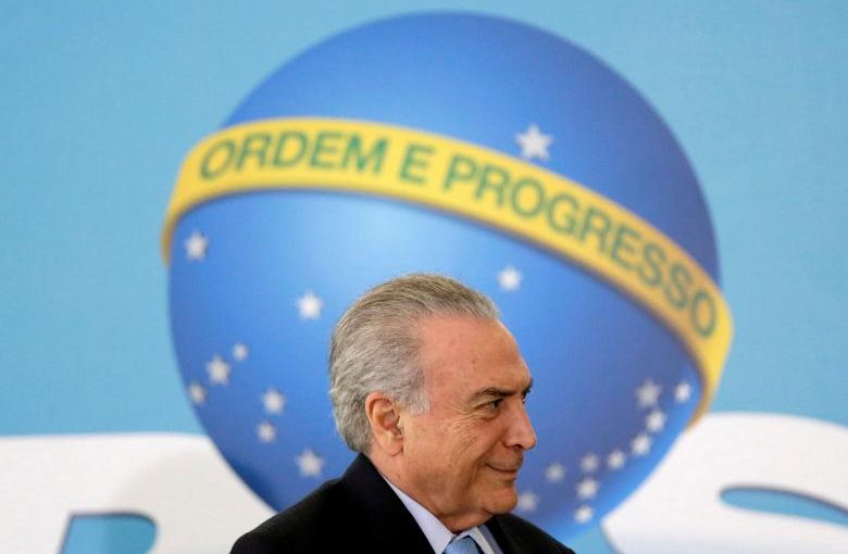 FILE PHOTO: Brazil's President Michel Temer looks on during a ceremony at the Planalto Palace in Brasilia, Brazil March 29, 2017. Picture taken March 29, 2017. REUTERS/Ueslei Marcelino