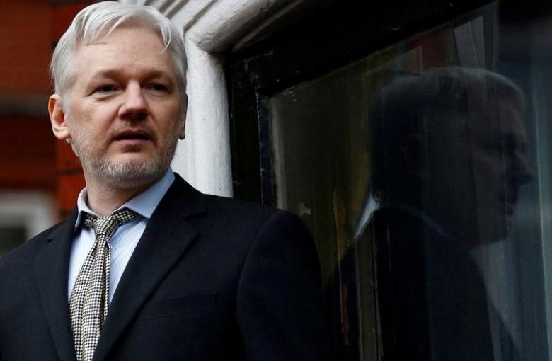 FILE PHOTO: WikiLeaks founder Julian Assange makes a speech from the balcony of the Ecuadorian Embassy, in central London, Britain February 5, 2016. REUTERS/Peter Nicholls/File Photo
