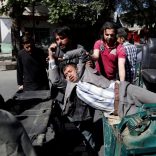 Men move an injured man to a hospital after a blast in Kabul, Afghanistan May 31, 2017. REUTERS/Mohammad Ismail