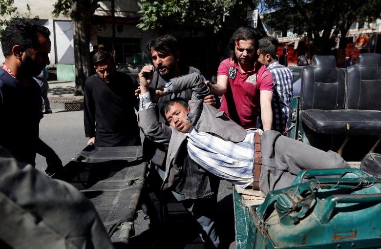 Men move an injured man to a hospital after a blast in Kabul, Afghanistan May 31, 2017. REUTERS/Mohammad Ismail