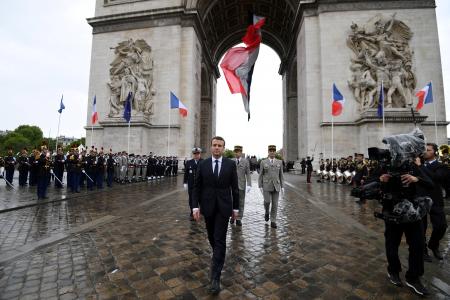 French President Emmanuel Macron walks after attending a ceremony at the Tomb of the Unknown Soldier at the Arc de Triomphe in Paris, France, May 14, 2017.   REUTERS/Alain Jocard/Pool