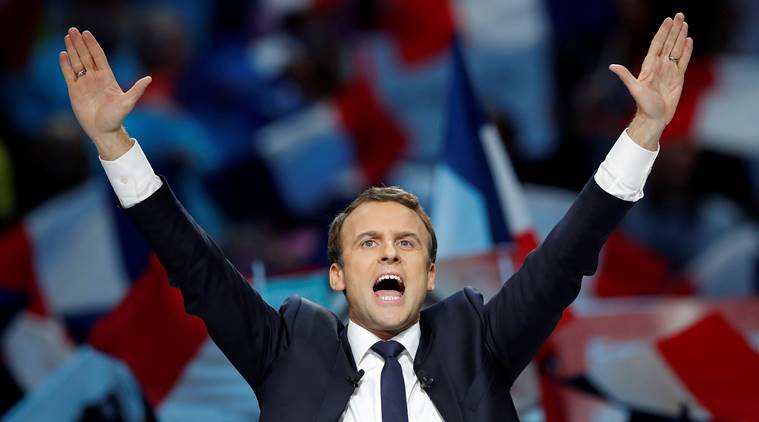 FILE PHOTO: Emmanuel Macron, head of the political movement En Marche !, or Onwards !, and candidate for the 2017 French presidential election, attends a campaign political rally in Paris, France, April 17, 2017. REUTERS/Christian Hartmann/File Photo