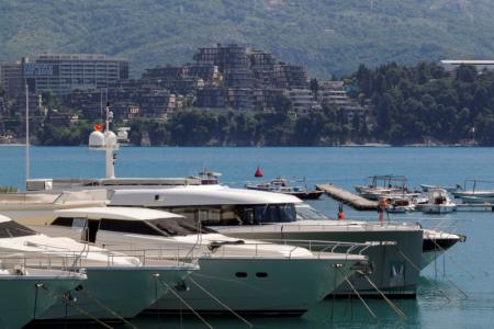 Newly-built real estate is seen behind luxury yachts in Budva, Montenegro, May 15, 2017.  REUTERS/Stevo Vasiljevic