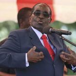 FILE PHOTO: Zimbabwe's President Robert Mugabe addresses the ZANU-PF party's top decision making body, the Politburo, in the capital Harare, February 10, 2016. REUTERS/Philimon Bulawayo/File Photo