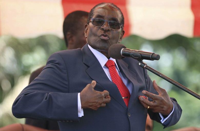 FILE PHOTO: Zimbabwe's President Robert Mugabe addresses the ZANU-PF party's top decision making body, the Politburo, in the capital Harare, February 10, 2016. REUTERS/Philimon Bulawayo/File Photo