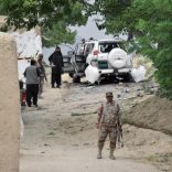 Soldiers and security officials guard a car after a bomb exploded next to a convoy of the deputy chairman of the Pakistan Senate, Senator Ghafoor Haideri, in Mastung, Pakistan May 12, 2017. REUTERS/Naseer Ahmed