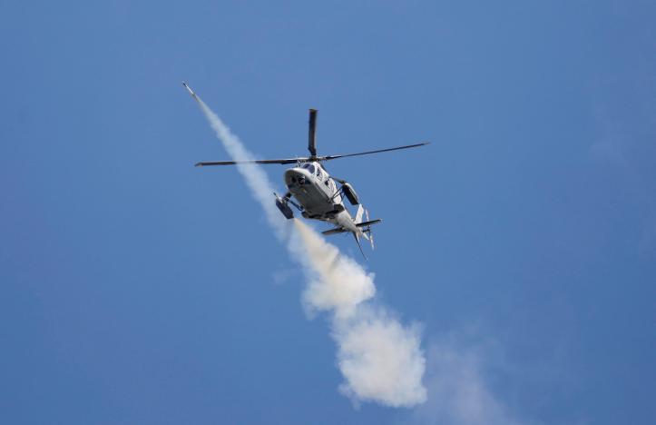 A Philippine Air Force attack helicopter fires a rocket as they continue to assault the Maute group in Marawi City in southern Philippines May 29, 2017. REUTERS/Erik De Castro