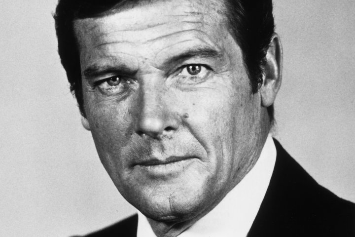 circa 1975:  Studio headshot portrait of English actor Roger Moore wearing a jacket and tie.  (Photo by American Stock/Getty Images)