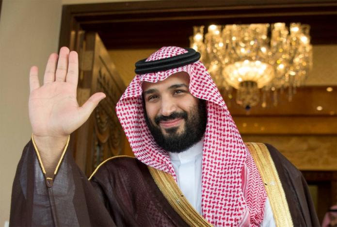 FILE PHOTO: Saudi Deputy Crown Prince Mohammed bin Salman waves as he meets with Philippine President Rodrigo Duterte in Riyadh, Saudi Arabia April 11, 2017. Bandar Algaloud/Courtesy of Saudi Royal Court/File Photo/Handout via REUTERS