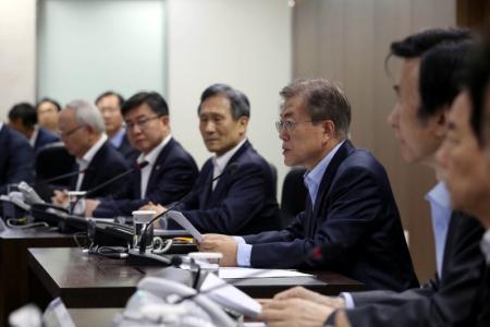 South Korean President Moon Jae-in presides over National Security Council at the Presidential Blue House in Seoul, South Korea, May 14, 2017.   Baek Seung-ryol/Yonhap via REUTERS