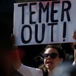 A woman demonstrates against Brazil's president Michel Temer during a protest in Union Square in the Manhattan borough of New York City, New York, U.S. May 21, 2017.   REUTERS/Carlo Allegri