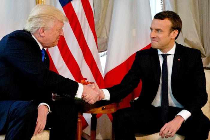 U.S. President Donald Trump (L) shakes hands with French President Emmanuel Macron before a working lunch ahead of a NATO Summit in Brussels, Belgium, May 25, 2017.     REUTERS/Peter Dejong/Pool