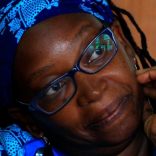 Ugandan prominent academic Stella Nyanzi stands in the dock at Buganda Road court charged with cybercrimes after she posted profanity-filled denunciations of president Yoweri Museveni on Facebook in Kampala, Uganda April 25, 2017. REUTERS/James Akena