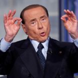 FILE PHOTO - Italy's former Prime Minister Silvio Berlusconi gestures during the television talk show "Porta a Porta" (Door to Door) in Rome, Italy June 21, 2017.  REUTERS/Remo Casilli/File Photo