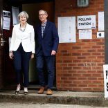 Britain's Primer Minister Theresa May and her husband Philip leave a polling station in Sonning, Britain, June 8, 2017. REUTERS/Eddie Keogh