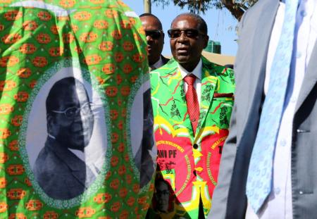 Zimbabwean President Robert Mugabe arrives at a rally in Marondera, Zimbabwe, June 2, 2017. REUTERS/Philimon Bulawayo