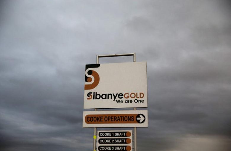 FILE PHOTO: A sign board is seen near the Sibanye gold mine in Westonaria, west of Johannesburg, South Africa, April 6, 2016. REUTERS/Siphiwe Sibeko/File Photo