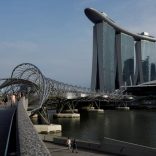 FILE PHOTO: People walk past the Marina Bay Sands hotel in Singapore April 10, 2017. REUTERS/Edgar Su/File Photo