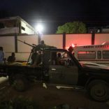 Armed security forces and rescue personnel are seen at the scene of an attack outside an hotel in Mogadishu, Somalia June 14, 2017. REUTERS/Stringer