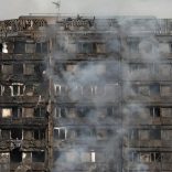Smoke billows from a tower block severly damaged by a serious fire, in north Kensington, West London, Britain June 14, 2017. REUTERS/Neil Hall